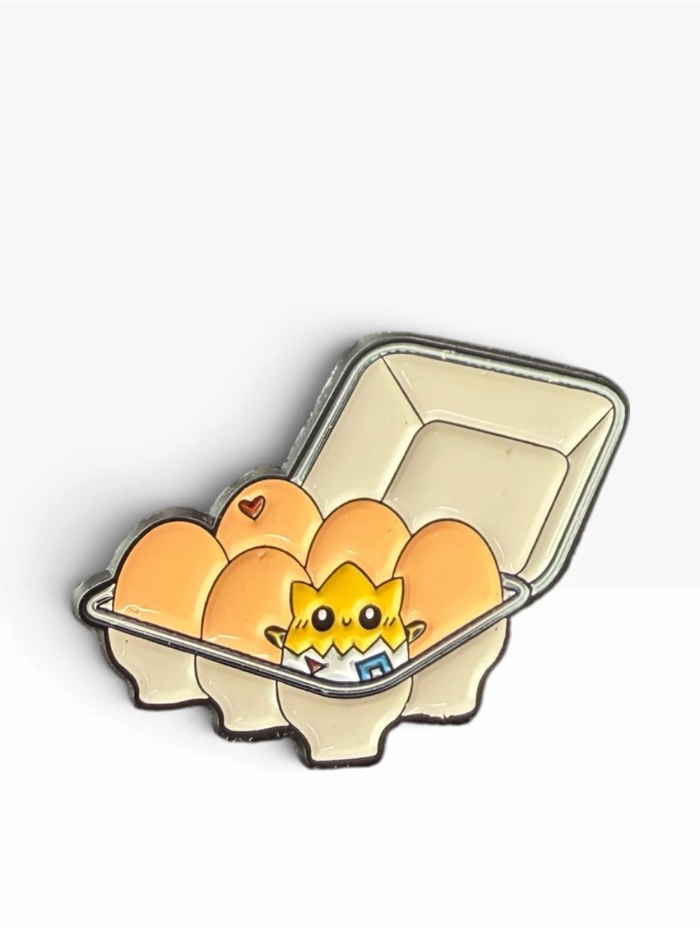 Pokémon Togepi in Egg Carton Enamel Pin